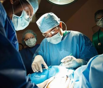 Hospital team providing surgical maternity care